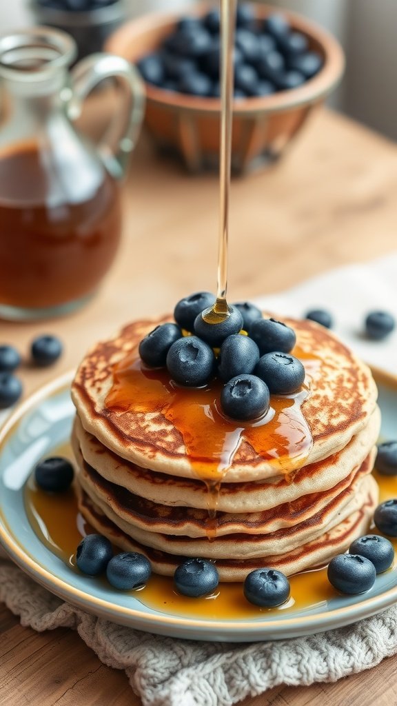 Whole grain pancakes topped with blueberries and syrup